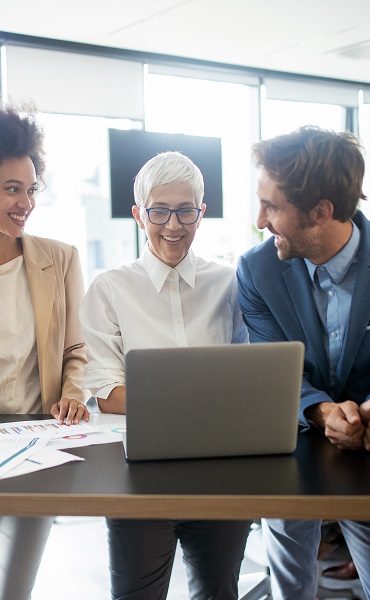 Business colleagues in conference meeting room during presentation